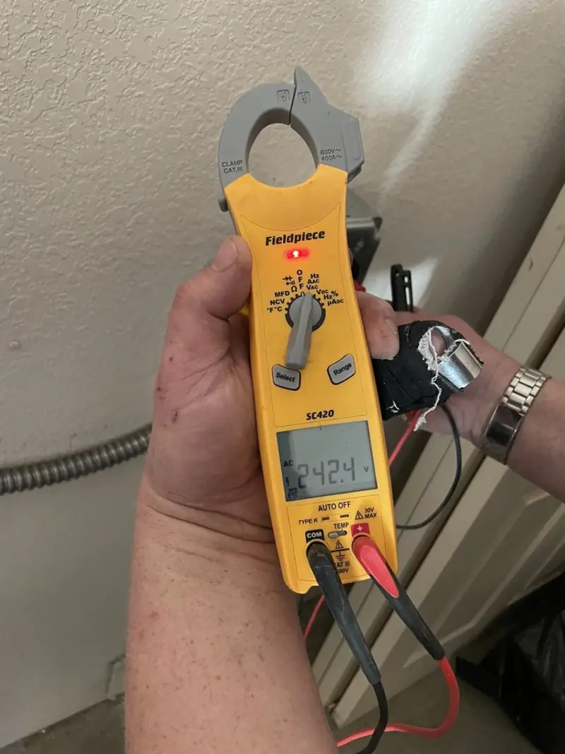 Voltage testing with clamp meter during Outlet Installation in Hornellsville